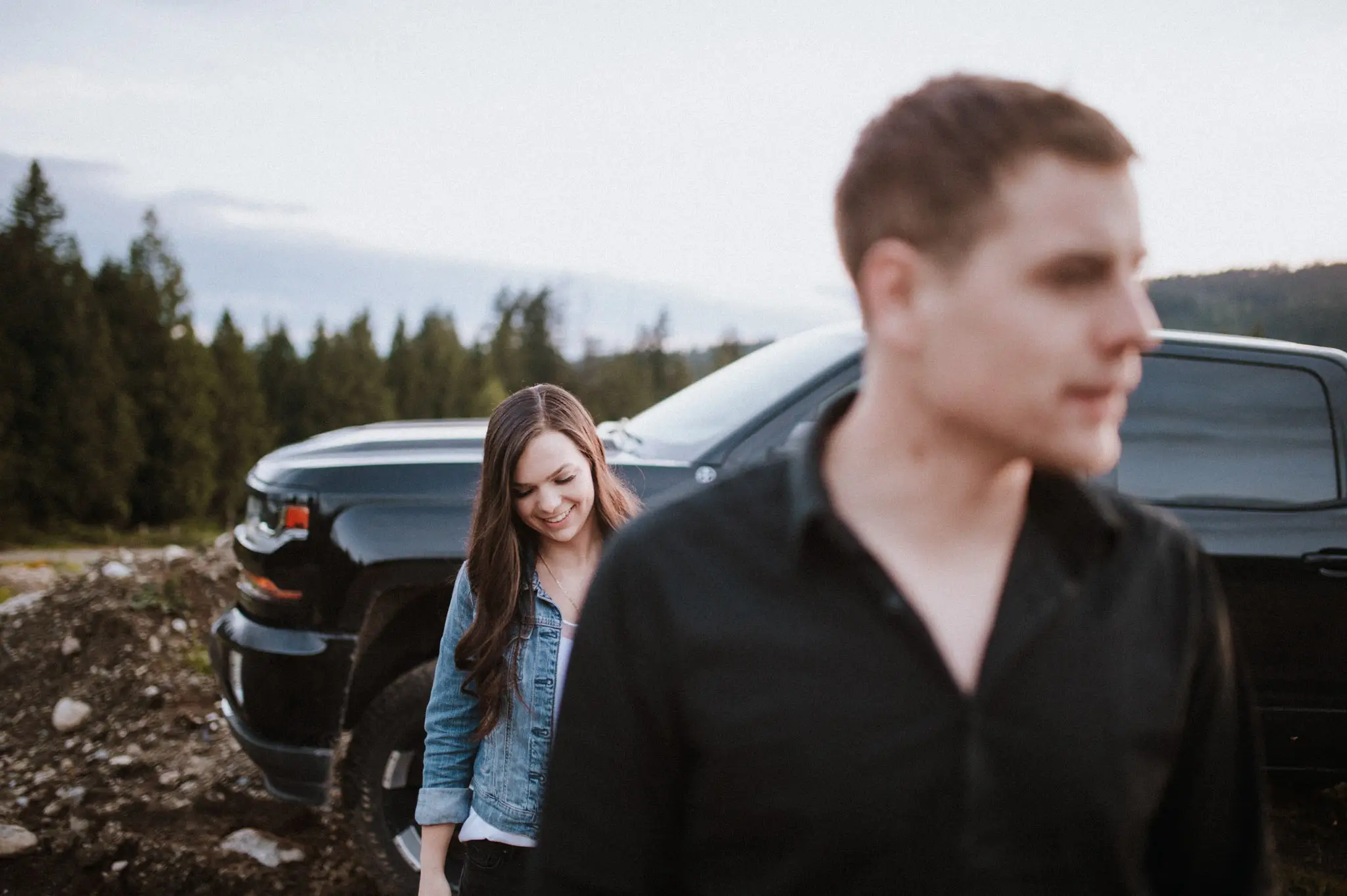 young couple hanging out by his truck Sunshine Coast BC