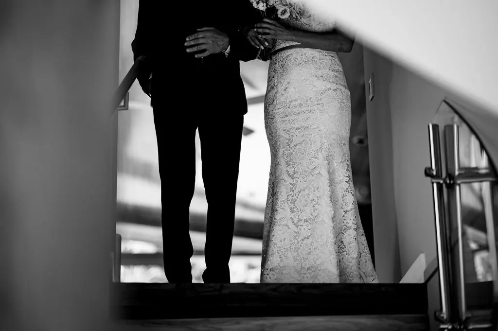 bride waits with dad to walk down aisle