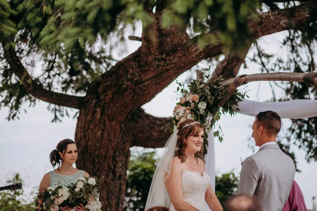 bride says her vows to her groom at their Sunshine Coast BC  wedding in Gibsons BC