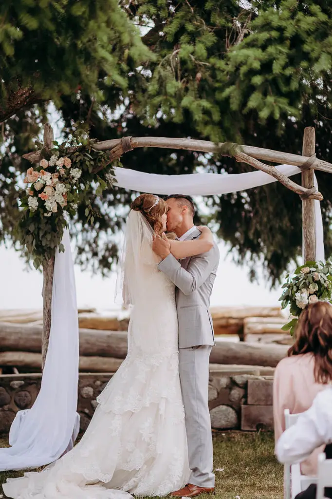 the first kiss as man and wife Chaster House Wedding Gibsons BC