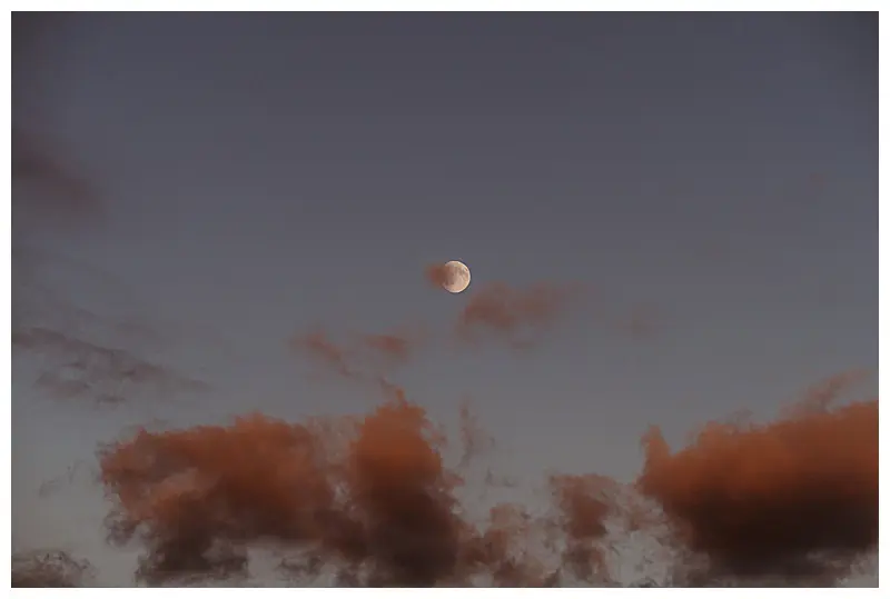 full moon rising at sunset in Troncones Mexico