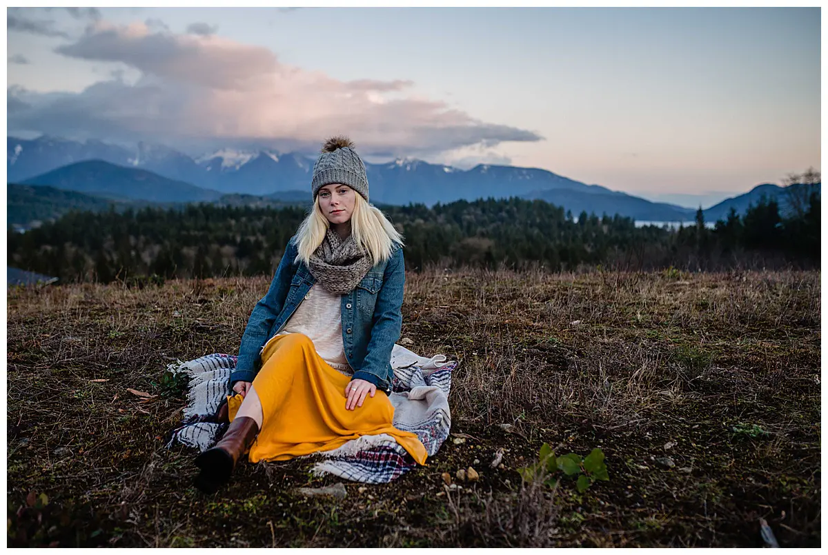 Girl walking in the mountains at sunset